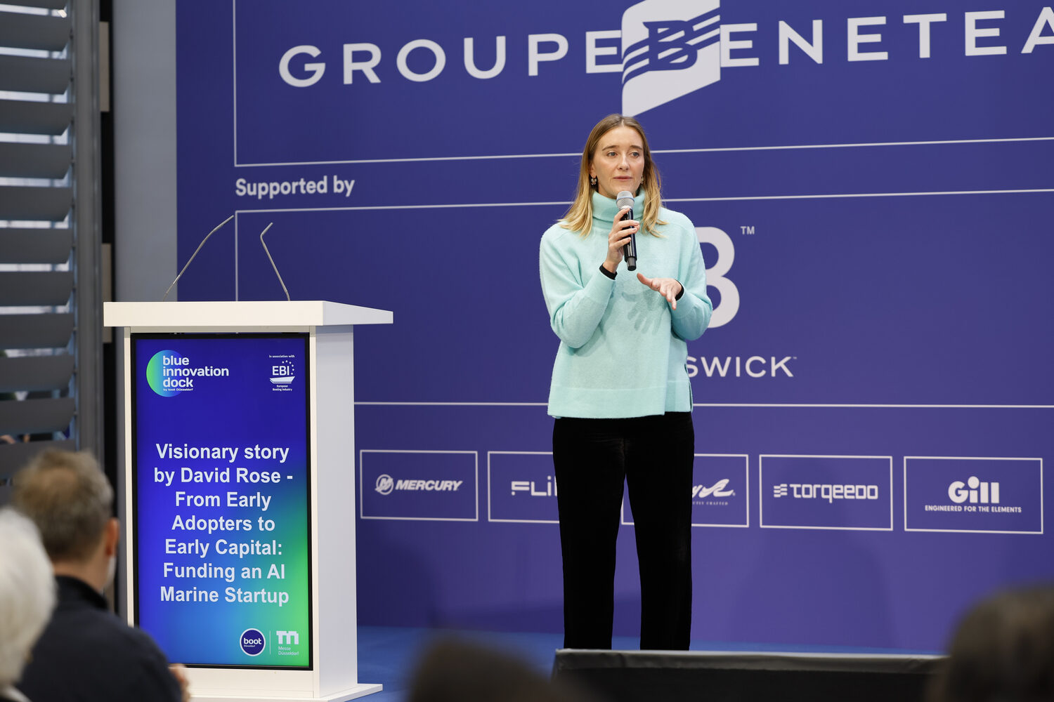 A founder pitching at the blue innovation dock